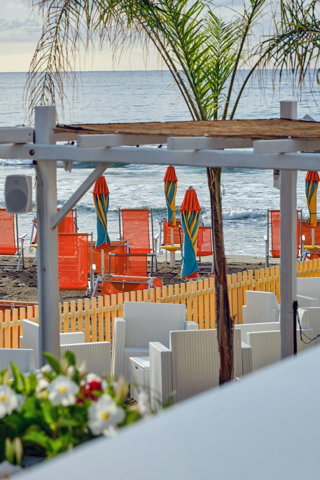 red and white wooden dock on sea during daytime