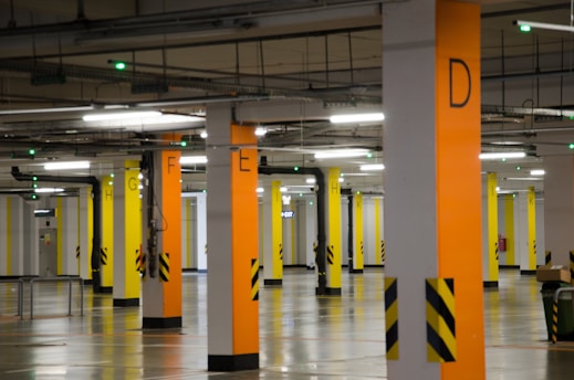 yellow and white tiled floor parking 