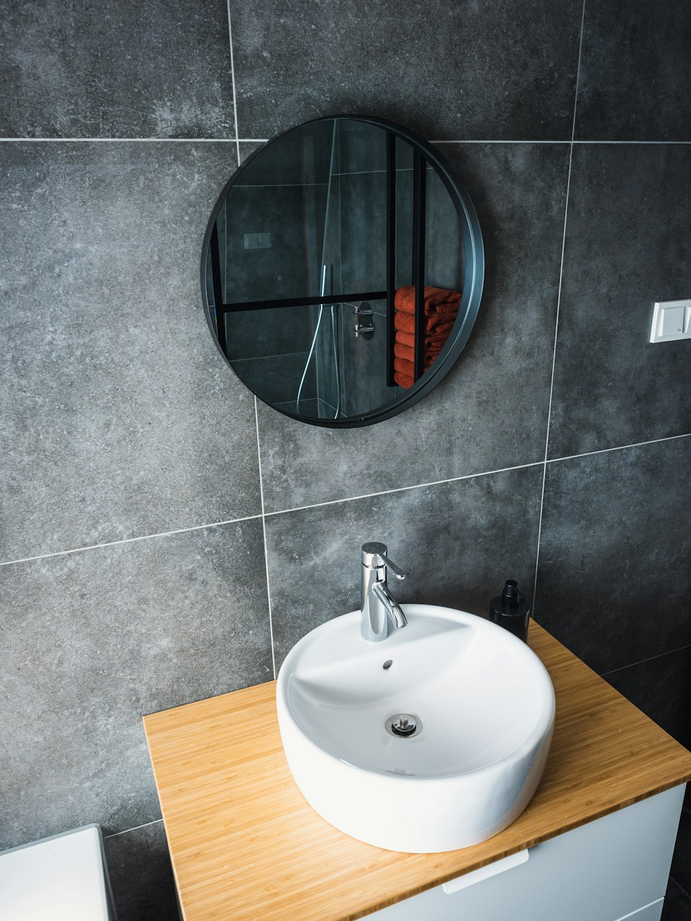 white ceramic sink with stainless steel faucet