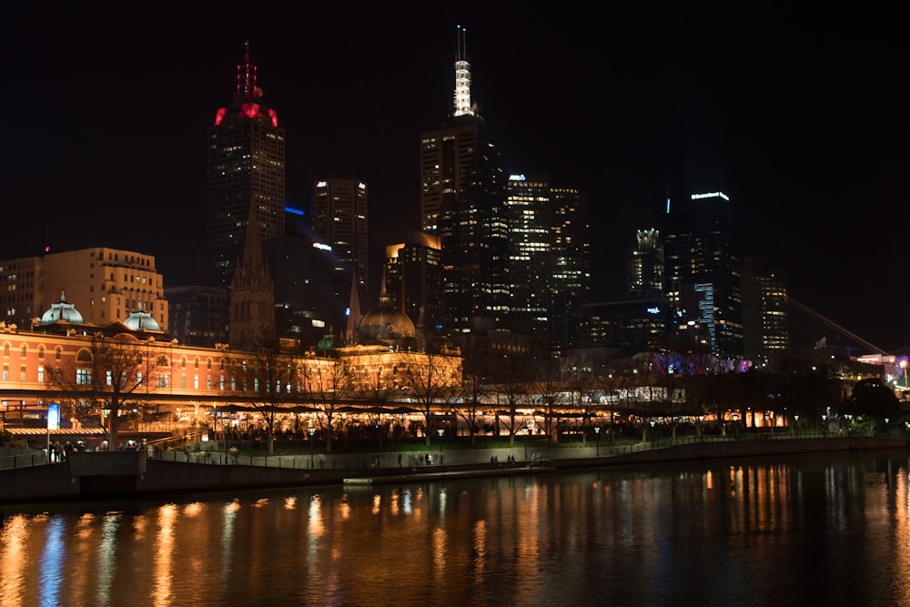 city skyline during night time