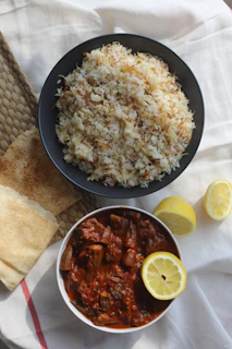 fried rice on black round plate