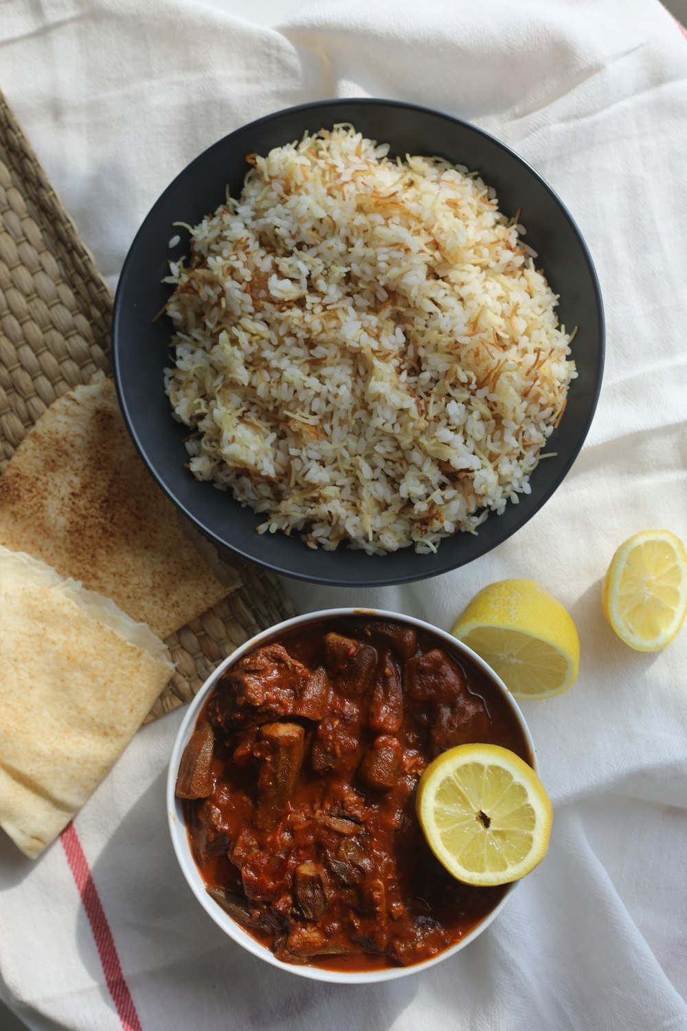 fried rice on black round plate