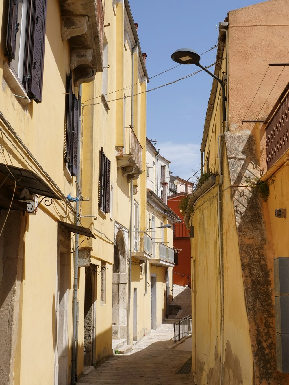 yellow and white concrete buildings during daytime