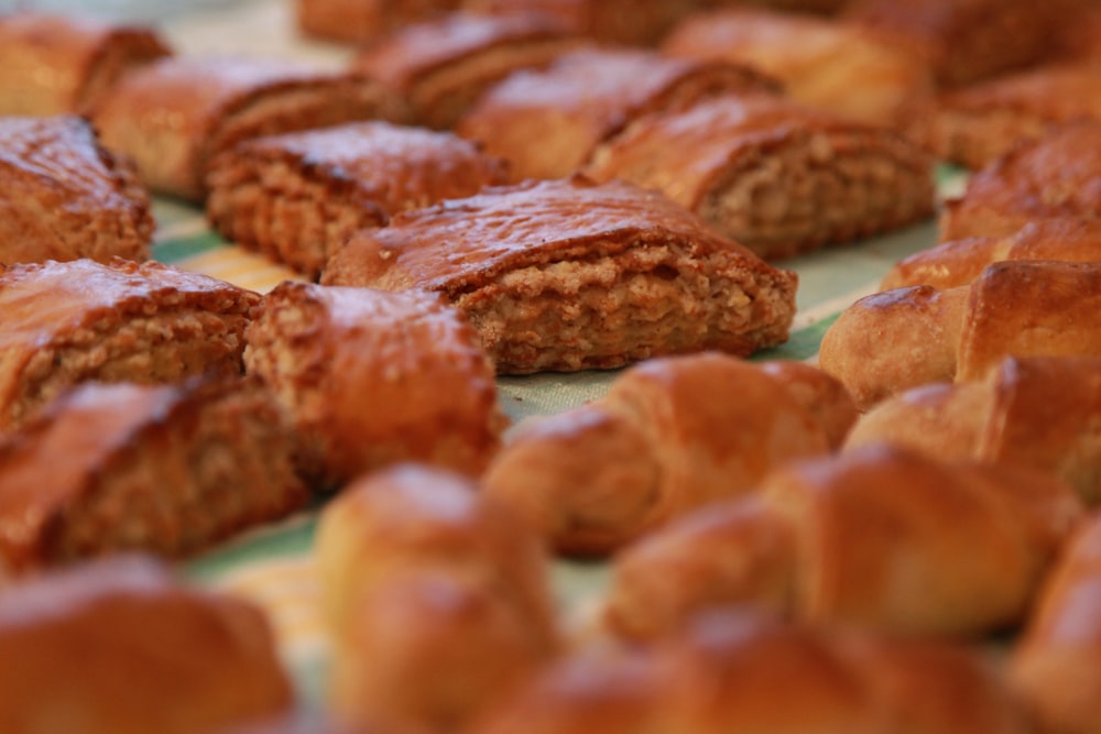 brown cookies on green and white ceramic plate