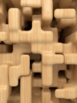 Top-down view of a modular furniture piece with interlocking wooden parts.