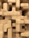 Close-up of beautifully finished wooden blocks stacked neatly on a rustic workbench.