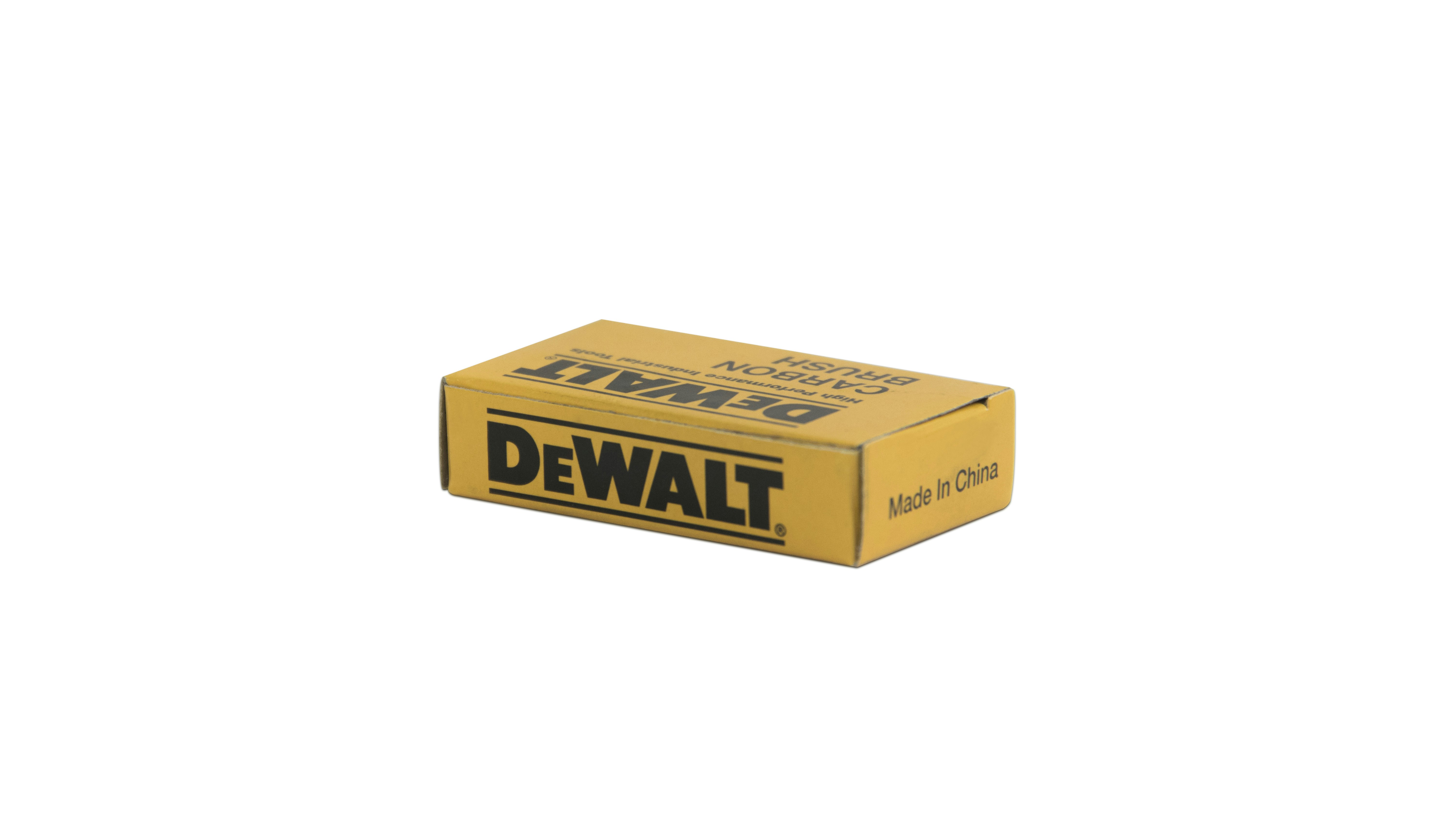 A yellow rectangular box with the DEWALT logo printed prominently on the top and side. The box includes the text 'Made In China' on one side, suggesting it contains a product related to the DEWALT brand, likely a tool or accessory.