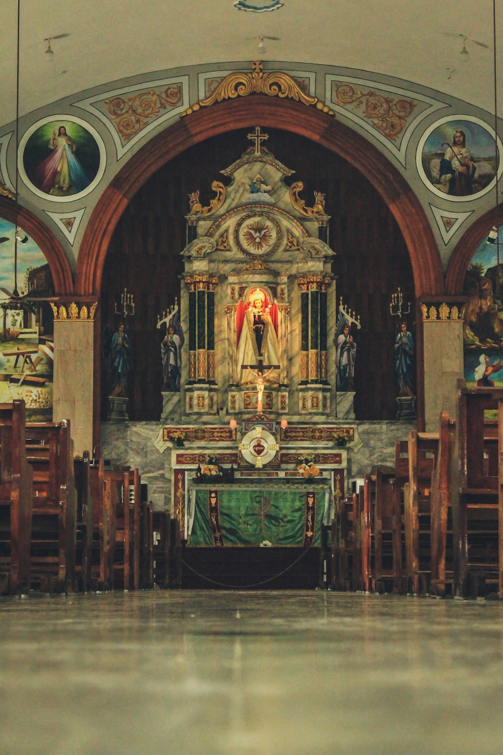 brown wooden chairs inside church