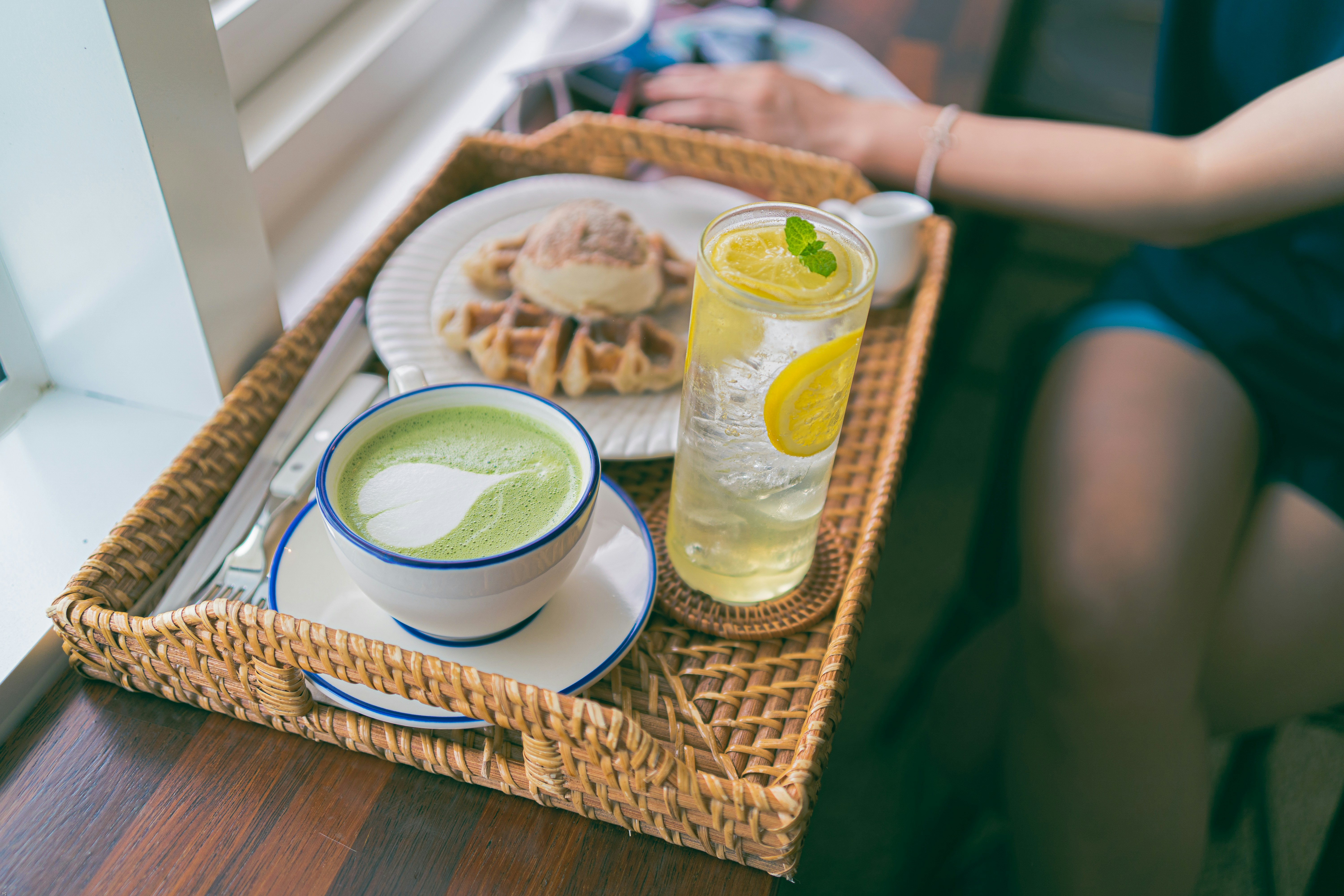 Green Smoothies With Spinach And Kale In A Glass With A Straw On A Wooden Table