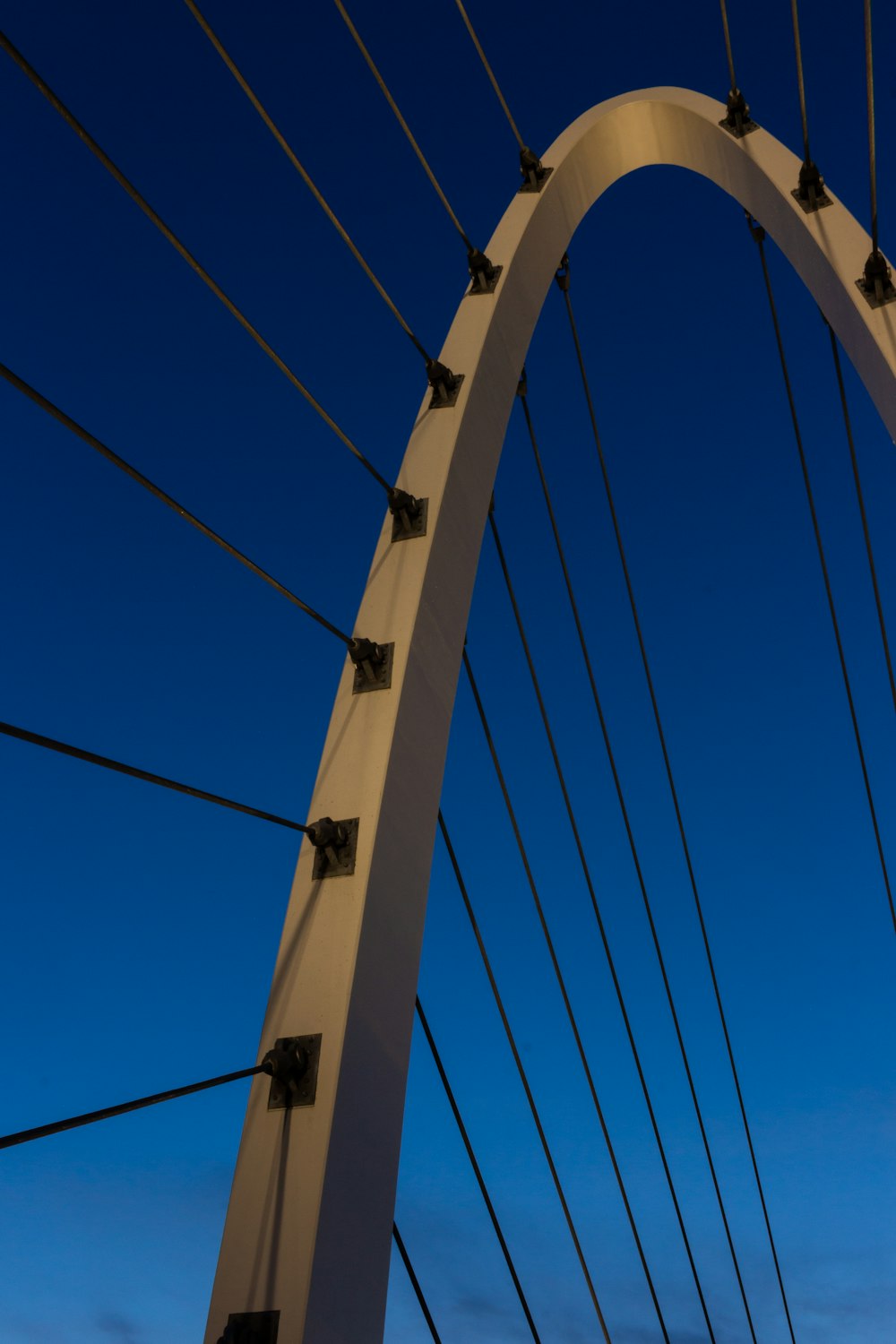 white bridge under blue sky during daytime