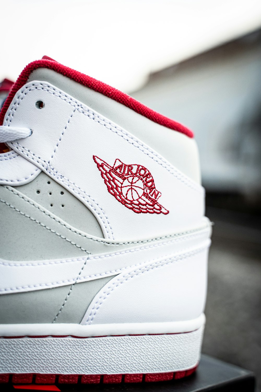 white and red nike air jordan 1 shoe