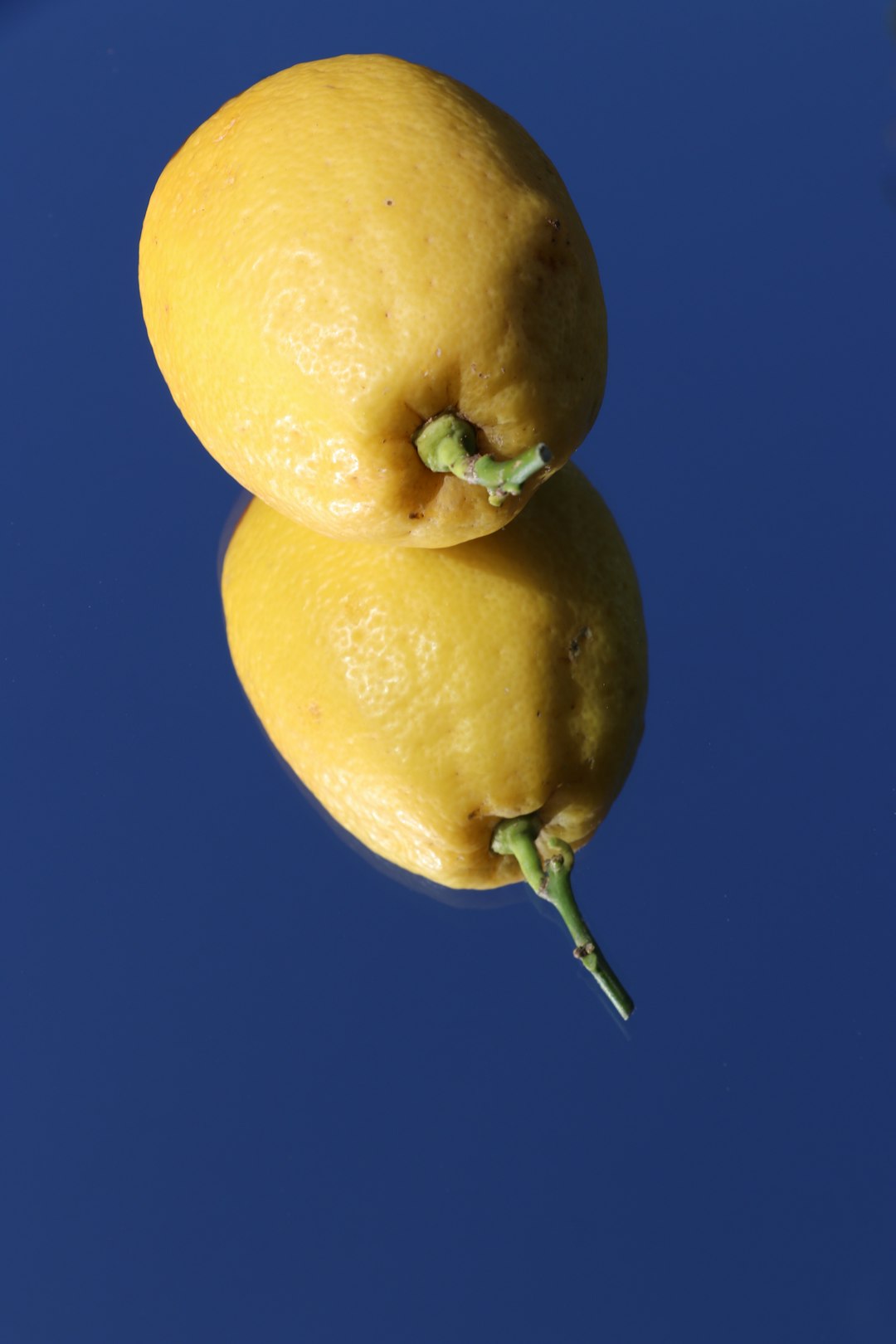 yellow fruit with blue background