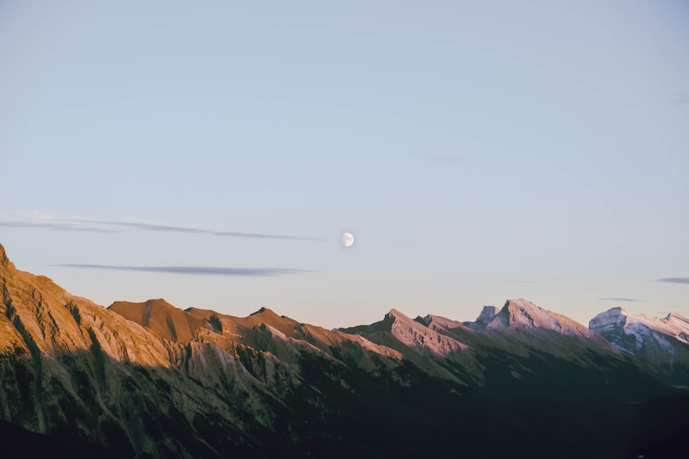 brown mountains under white sky during daytime