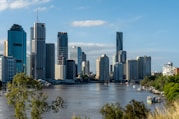 city skyline near body of water during daytime