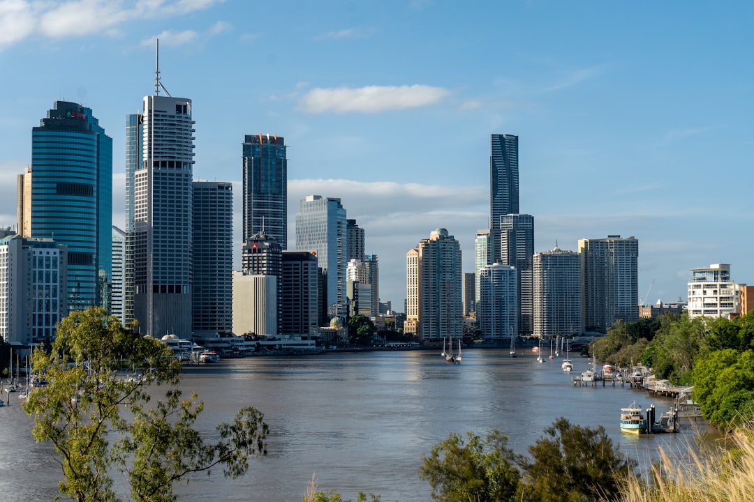 city skyline near body of water during daytime