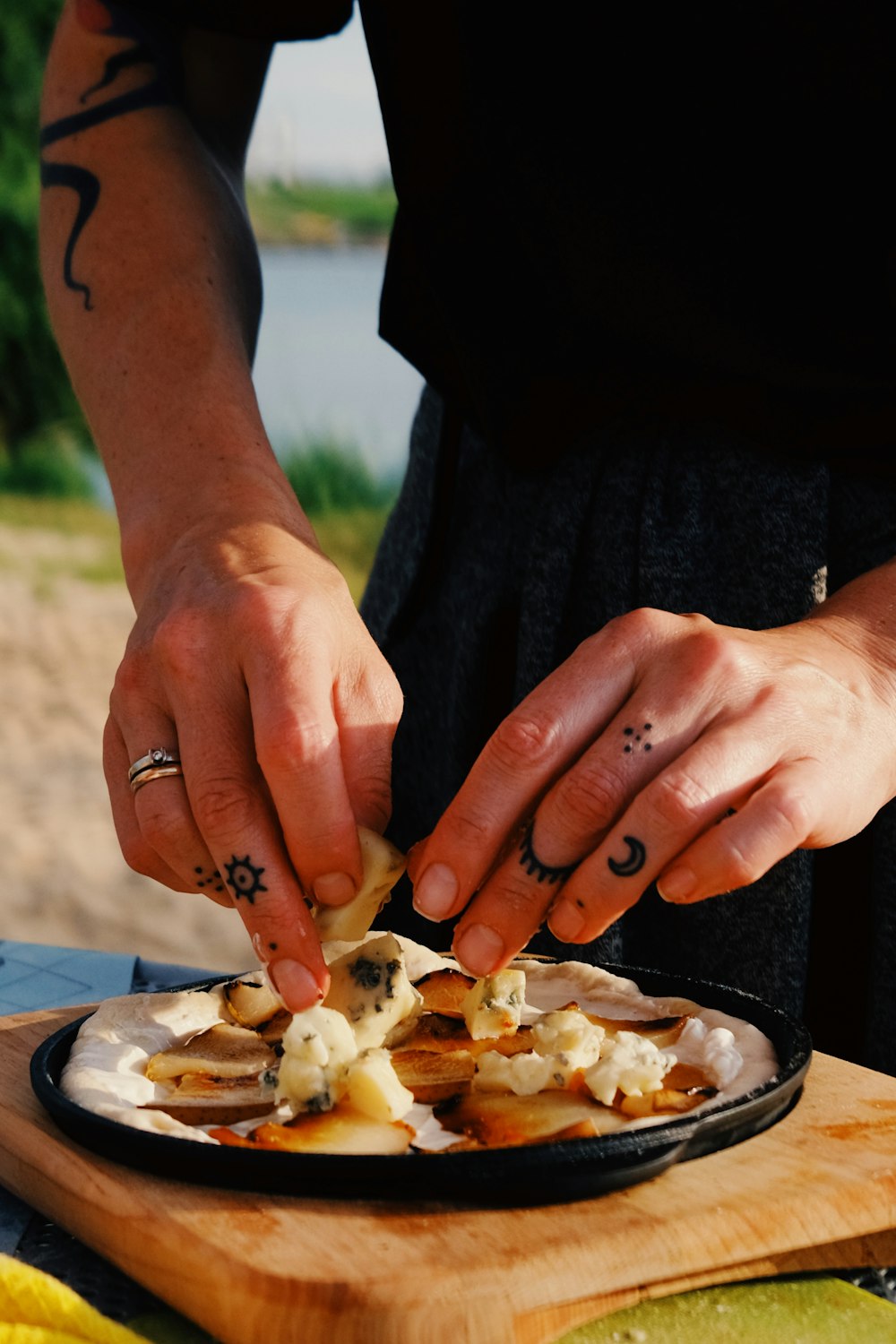 person holding white and brown food