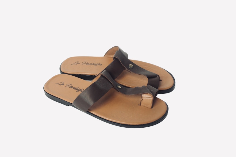 brown and black flip flops