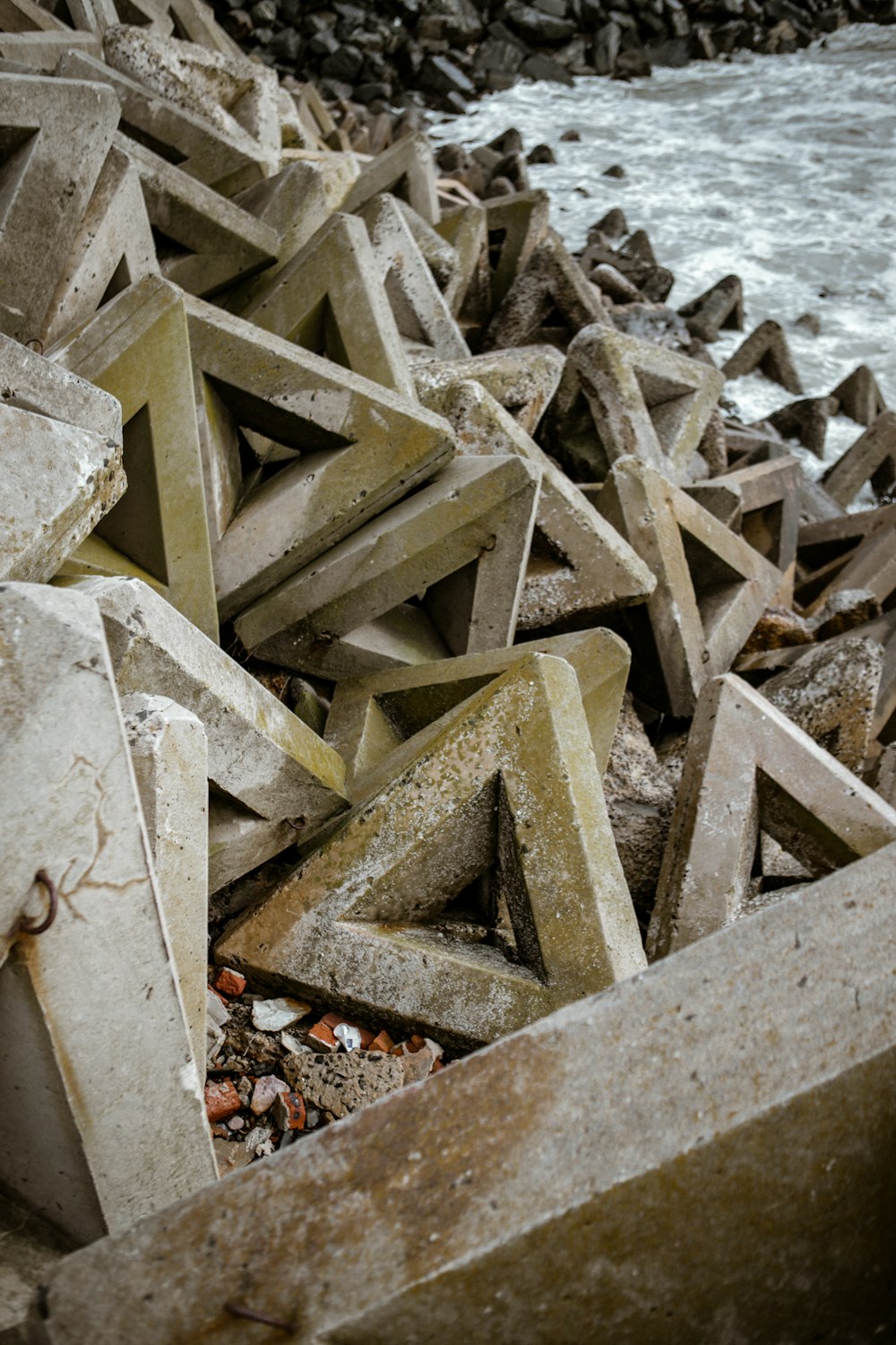 white concrete blocks on white sand