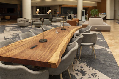 brown wooden table with chairs