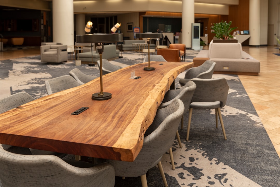 brown wooden table with chairs