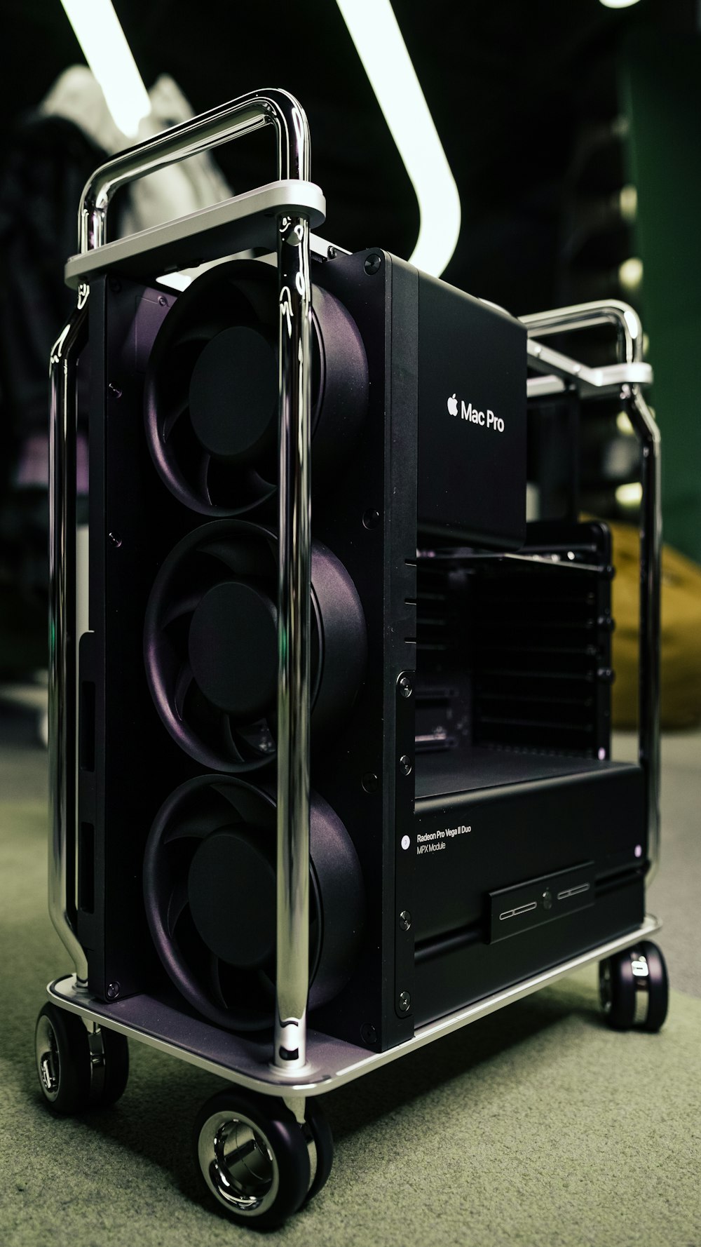 black and gray speaker on gray carpet