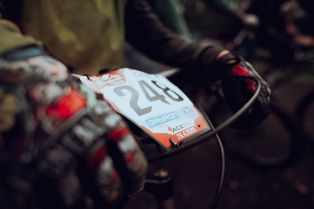 a close up of a number on a bike