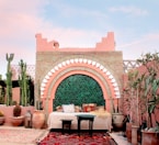 Elegant seating area with colorful cushions and traditional Mexican decor.