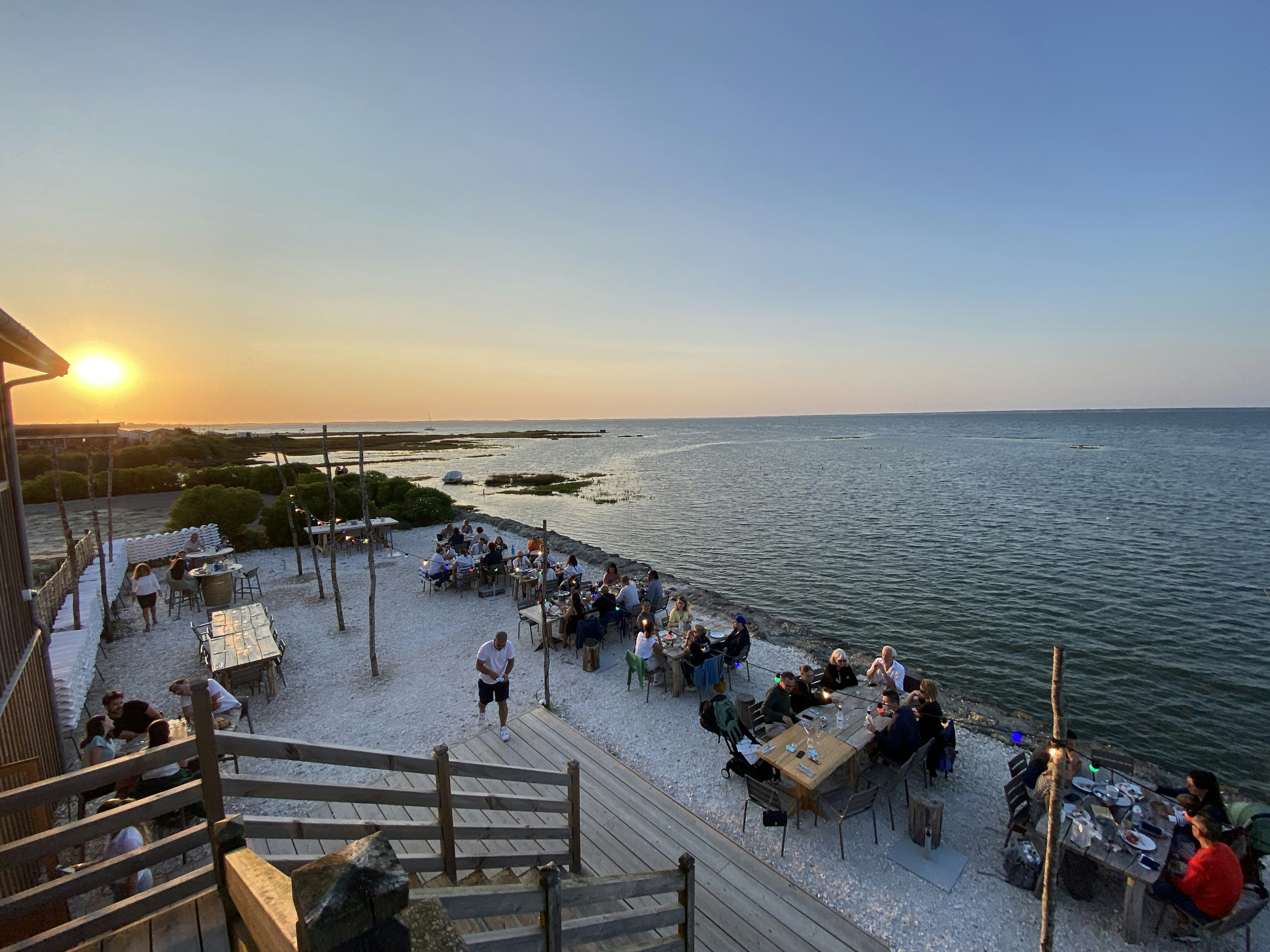 people on beach during sunset, 