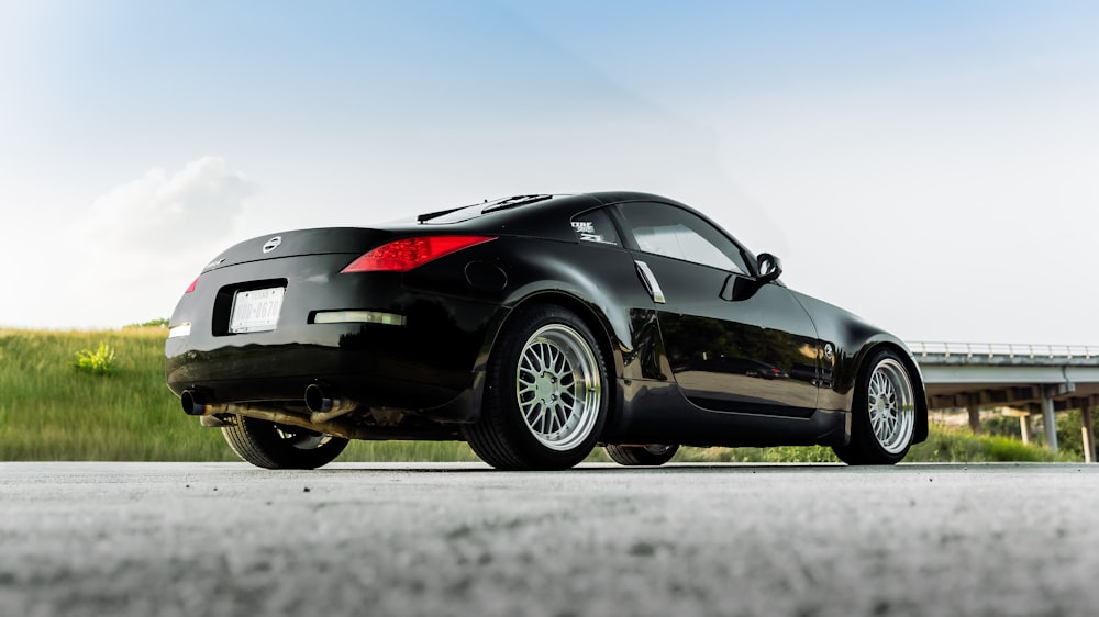 black porsche 911 on road during daytime