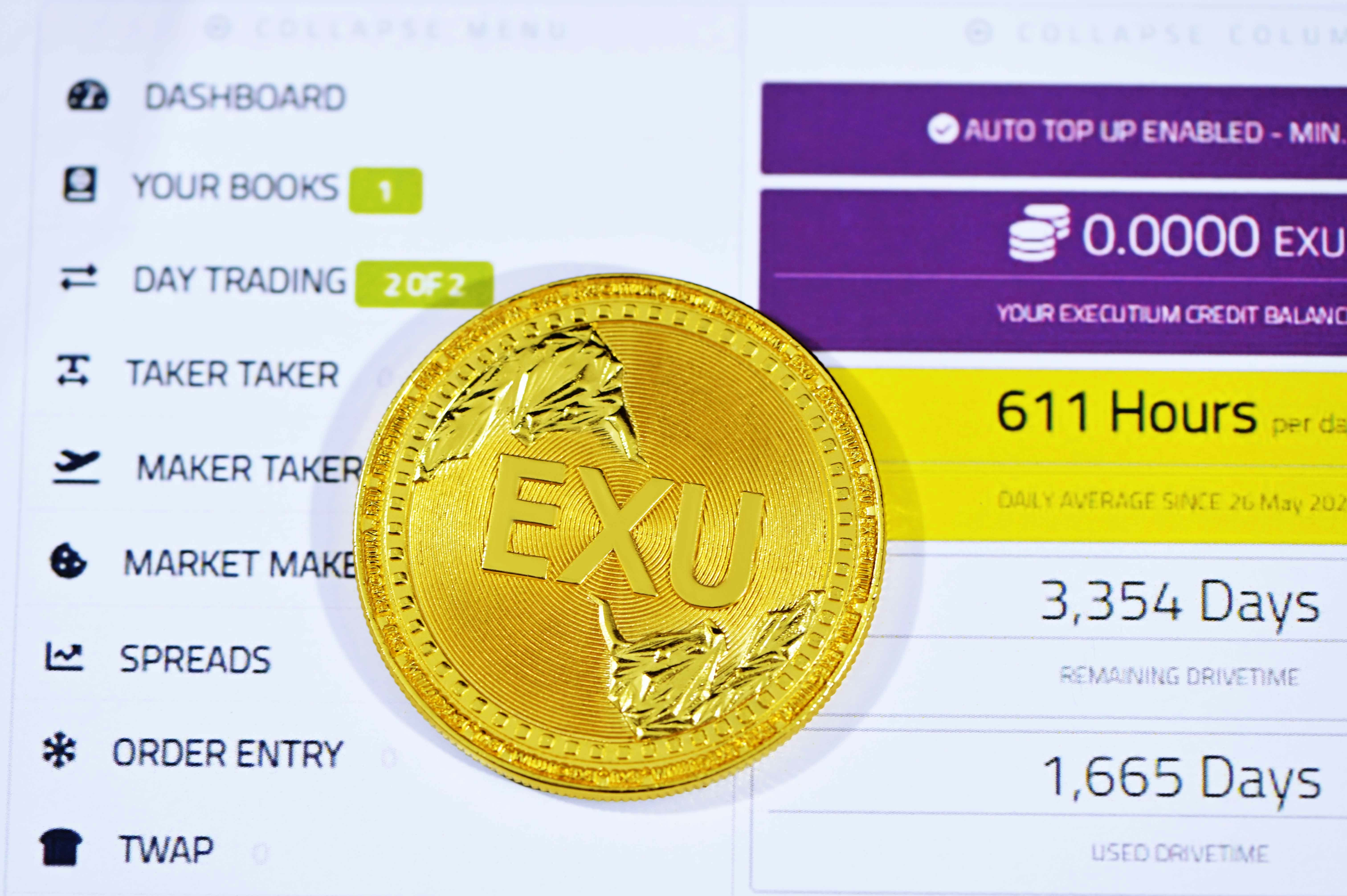A single Executium coin placed on an Executium trading site