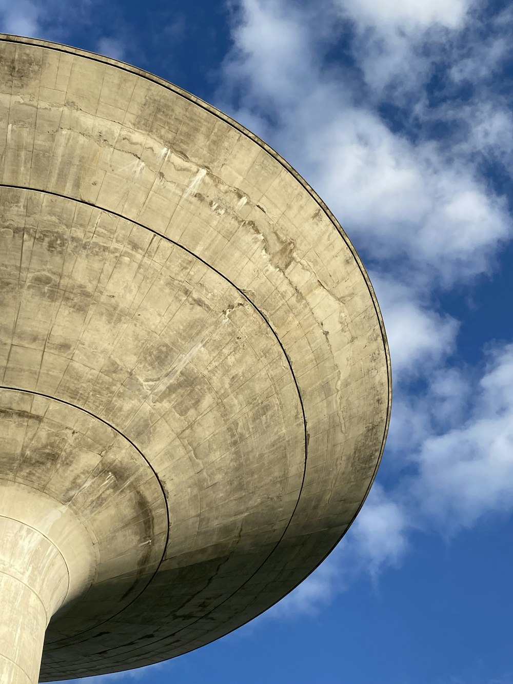 white concrete building under blue sky during daytime