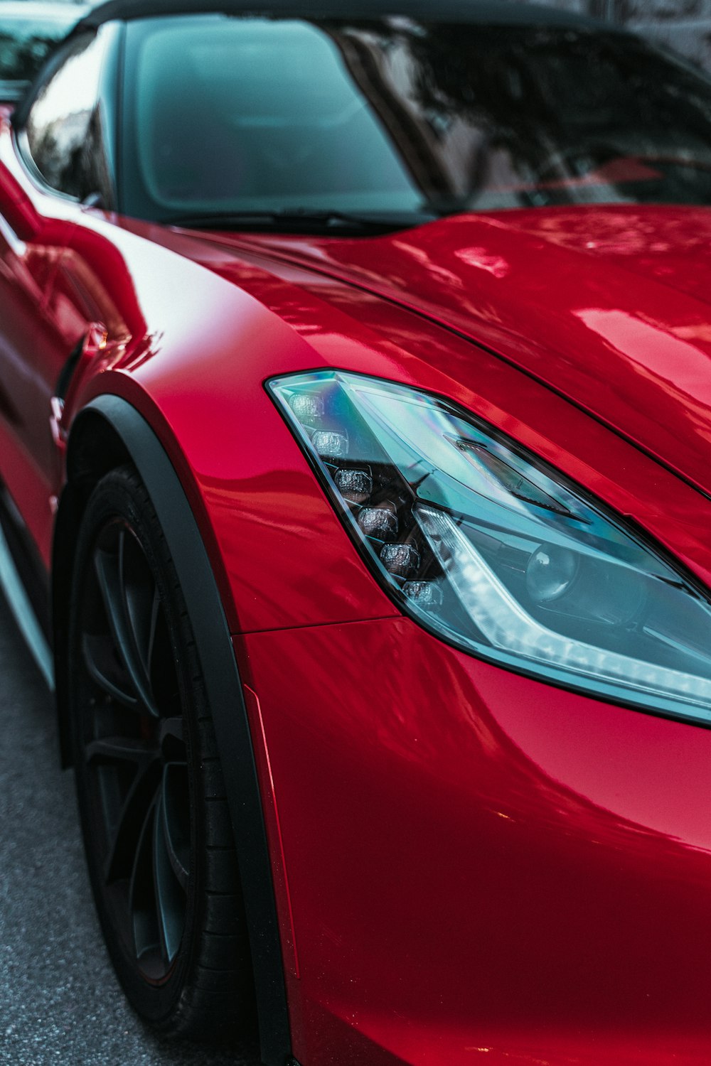 red ferrari car on road