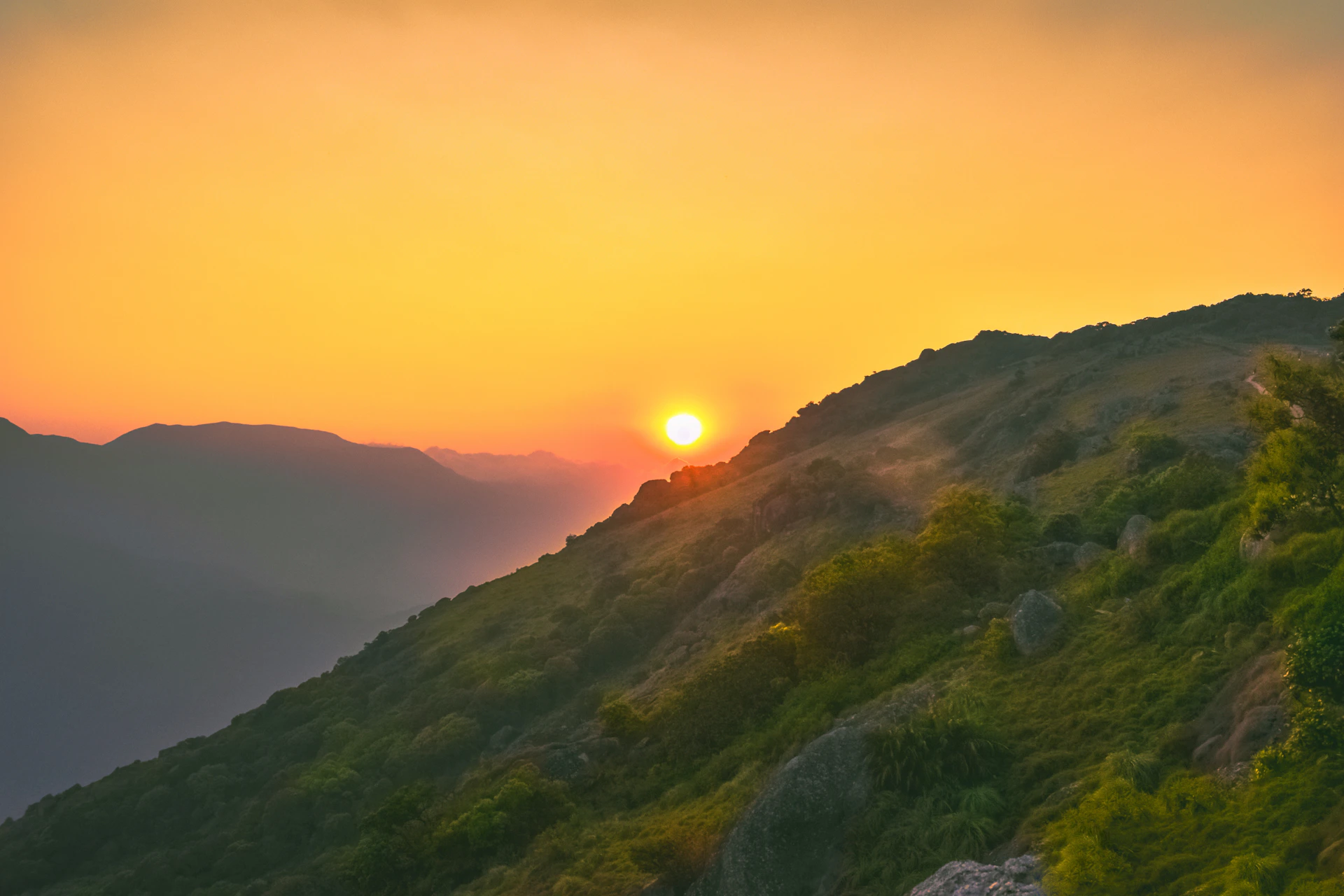 green mountain during golden hour