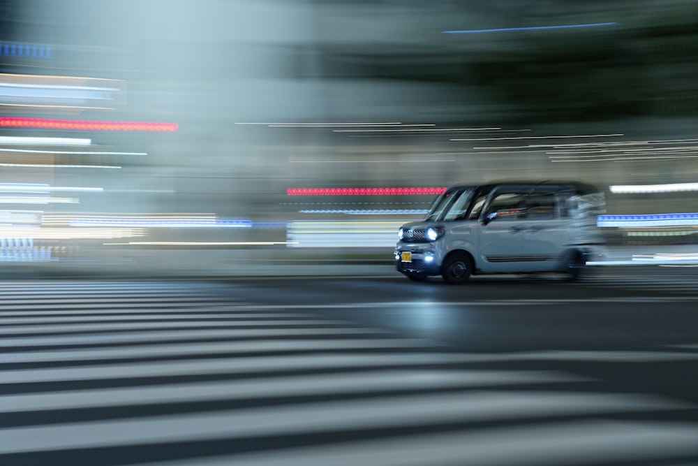 black suv on road during night time