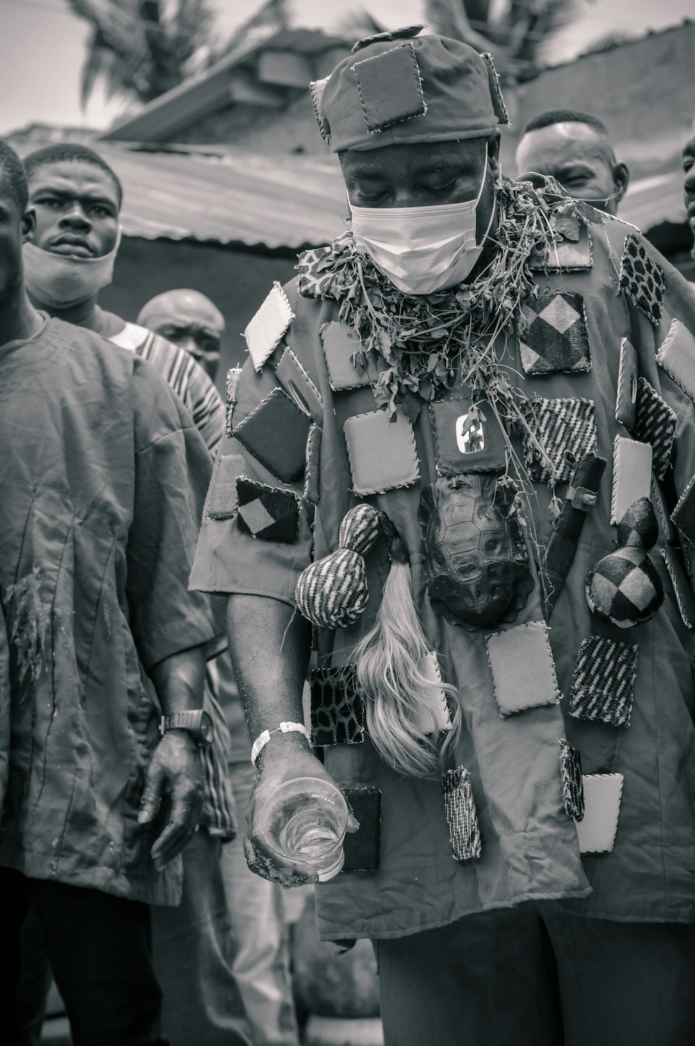 grayscale photo of people in traditional dress