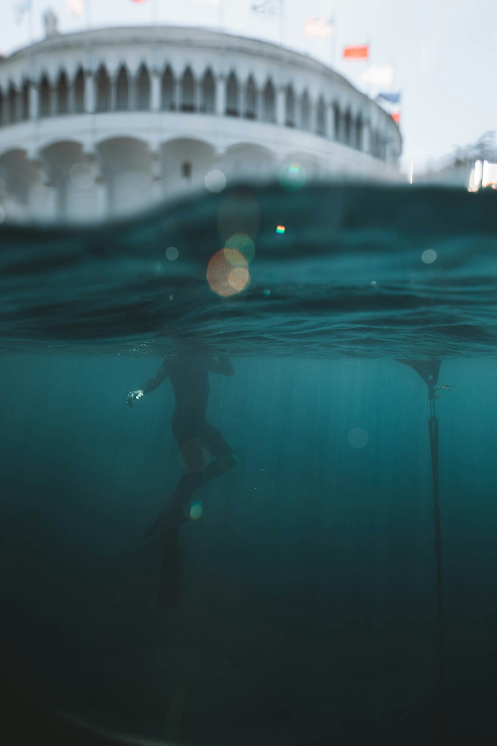 person in water with water droplets