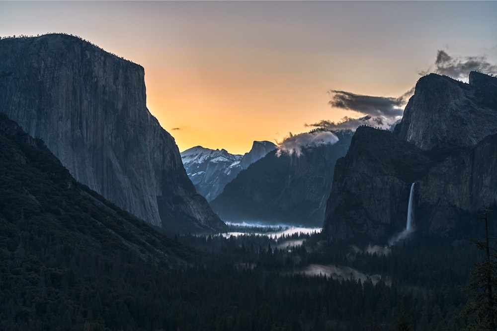 snow covered mountain during daytime