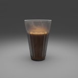 clear drinking glass with brown liquid