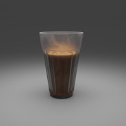 clear drinking glass with brown liquid