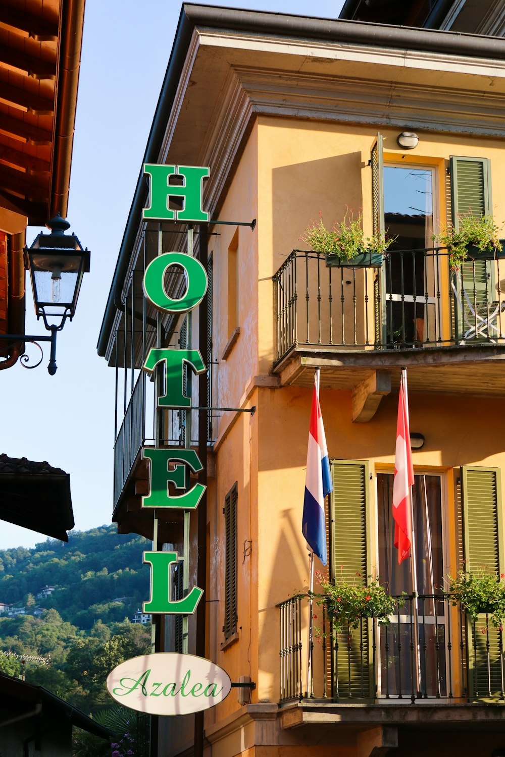 green and white wooden signage