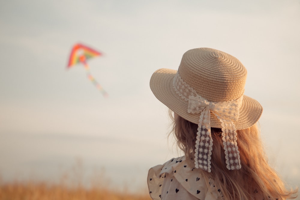 woman in white sun hat