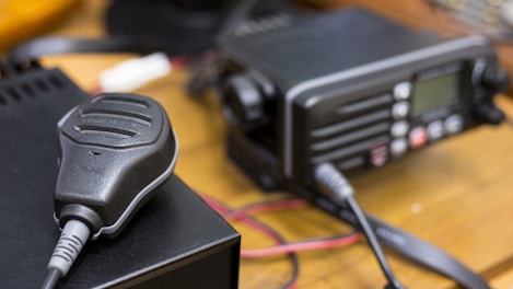 black corded device on black surface