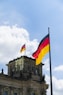 red yellow and blue flag on pole