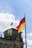 red yellow and blue flag on pole