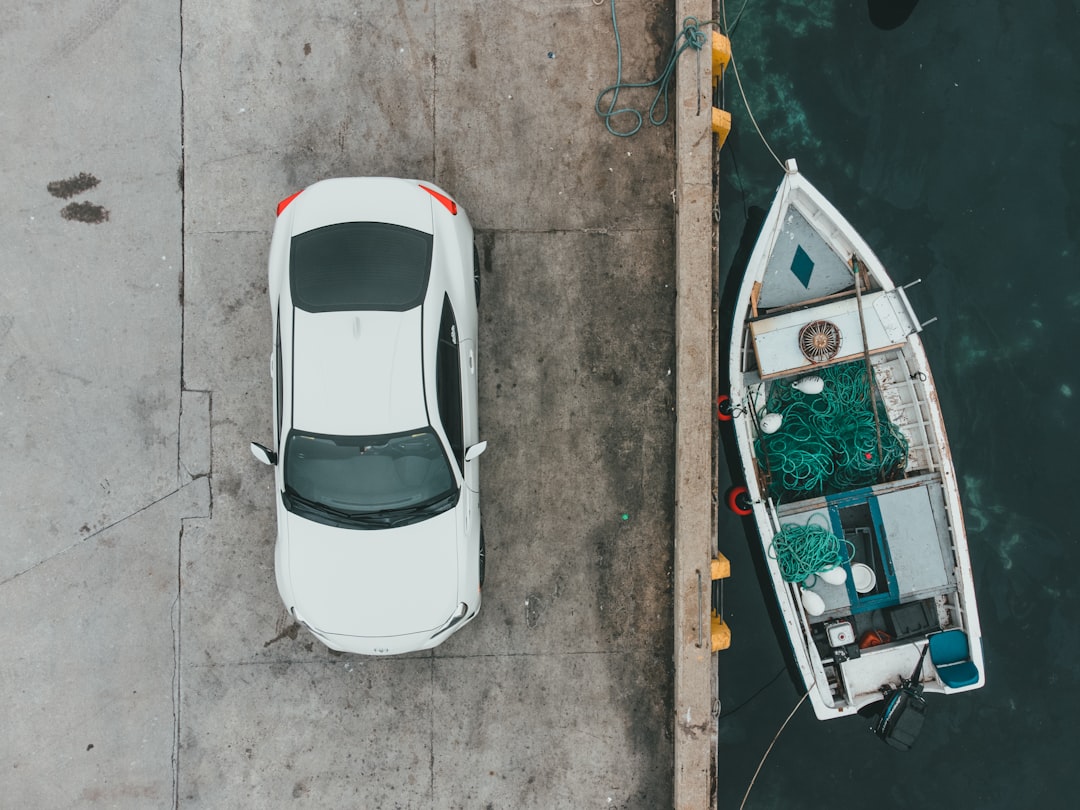 white car on parking lot