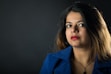 woman in blue collared shirt