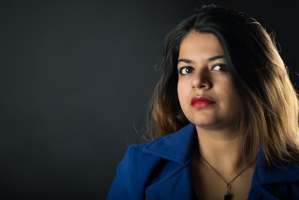 woman in blue collared shirt