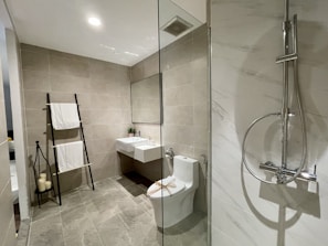white ceramic sink near white ceramic sink