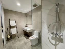 white ceramic sink near white ceramic sink