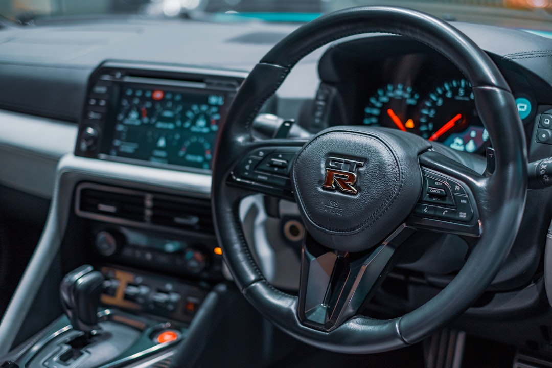 black and red steering wheel